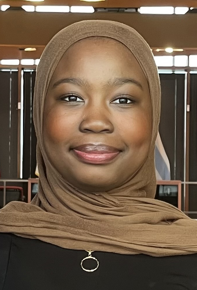 Trustee Shekoni
